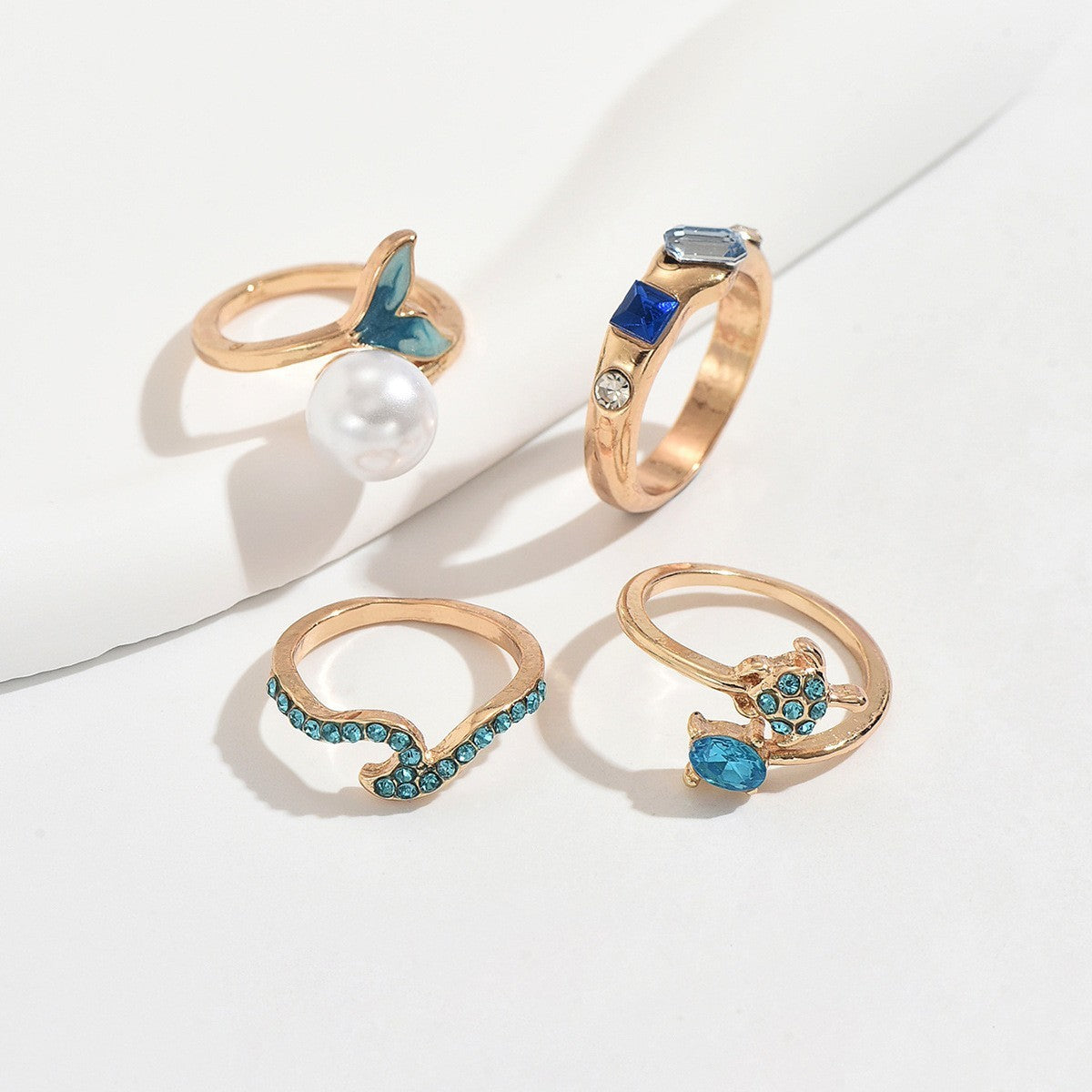 Dainty Ocean Wave & Dolphin Ring Set