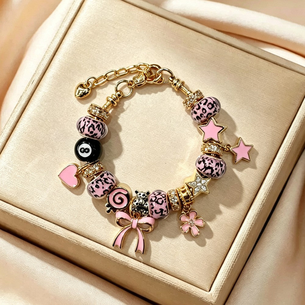 Playful Pink Leopard & Bow Charm Bracelet