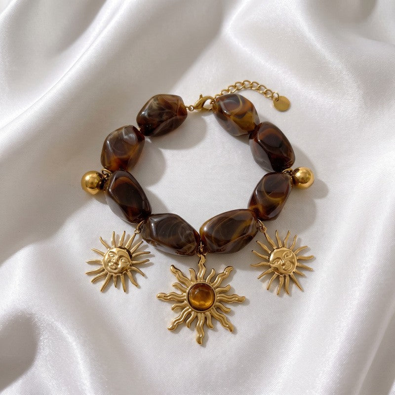 Vintage Amber Resin Sun Charm Bracelet