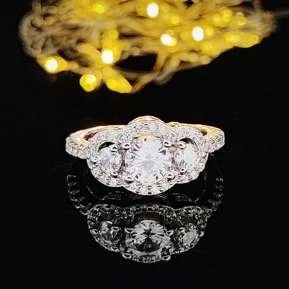 Classy Three Stone Halo Ring