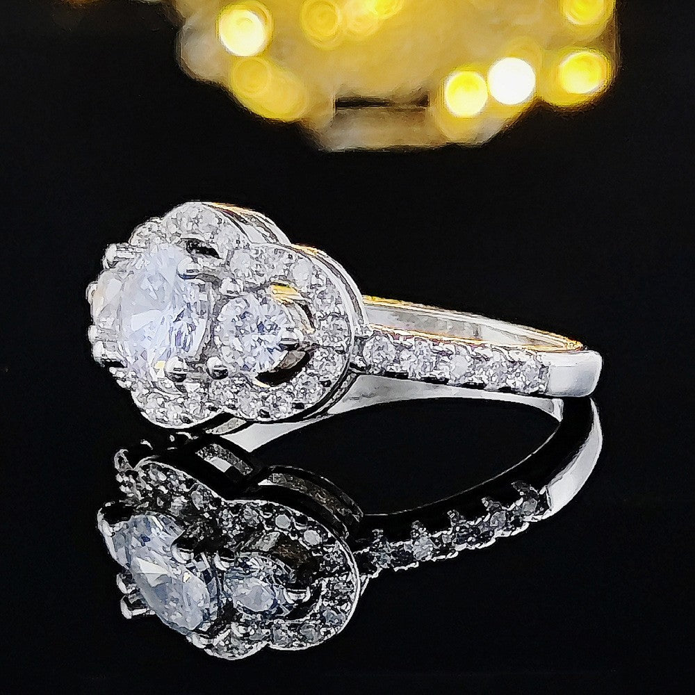 Classy Three Stone Halo Ring