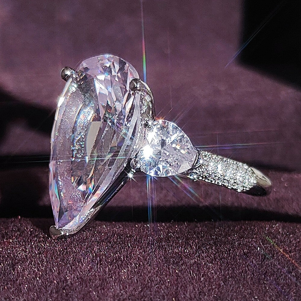 Elegant Pear Cut Three Stone Ring