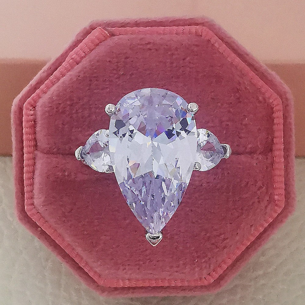 Elegant Pear Cut Three Stone Ring
