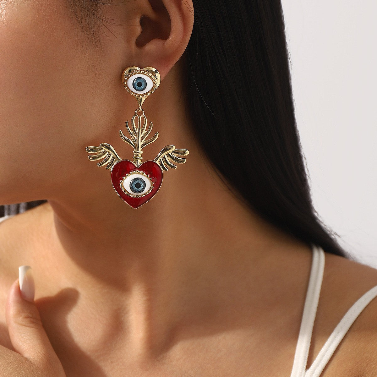 Classy Winged Heart Evil Eye Earrings