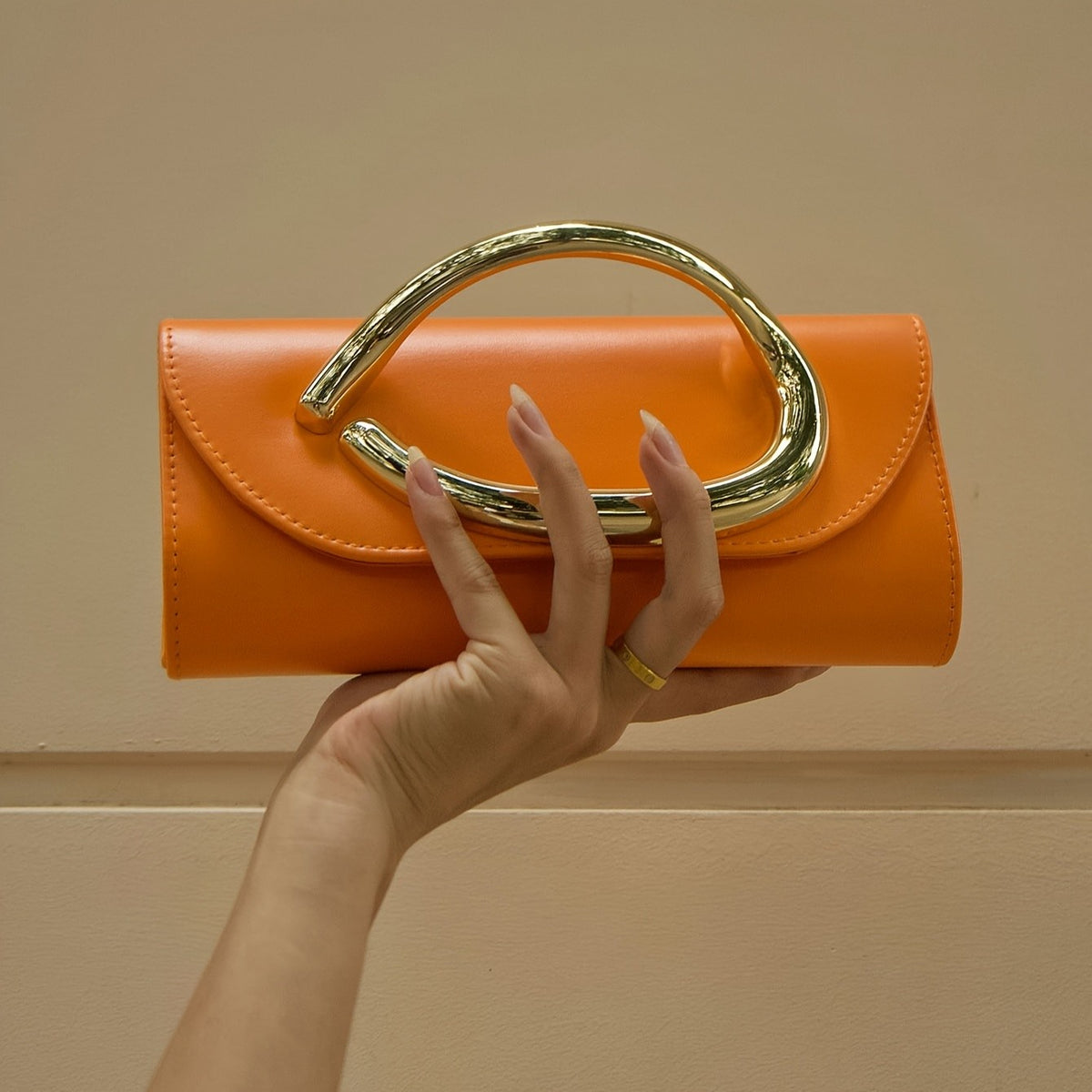 Classy Oval Metal Handle Clutch