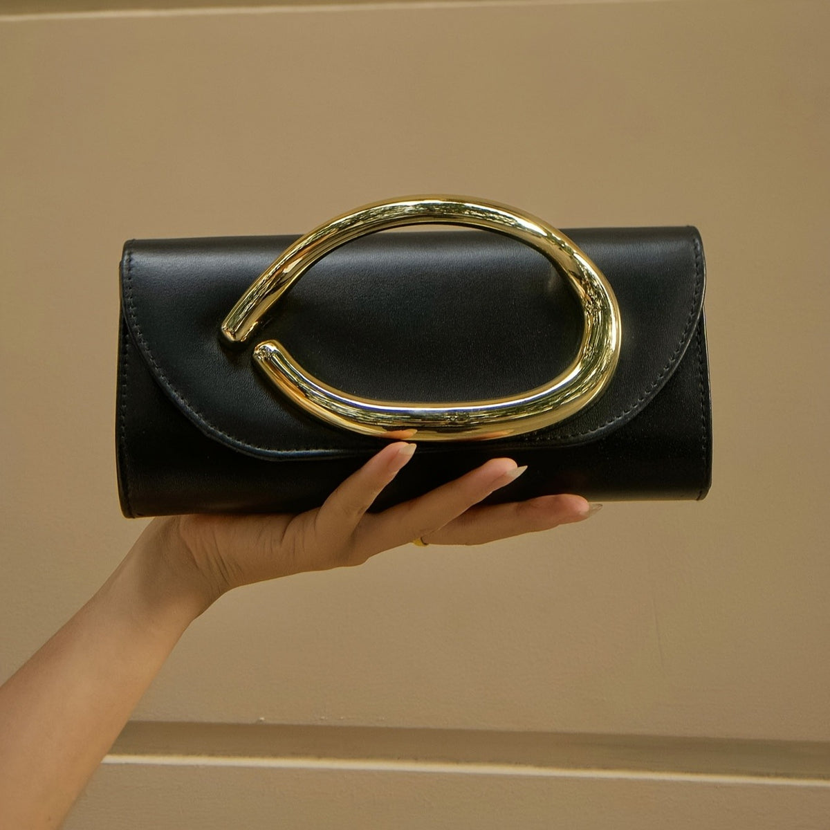 Classy Oval Metal Handle Clutch