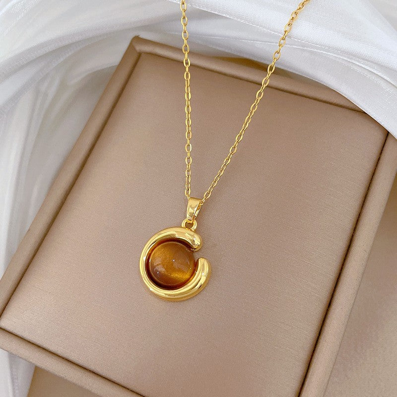 Elegant Amber Teardrop & Swirl Necklace Set