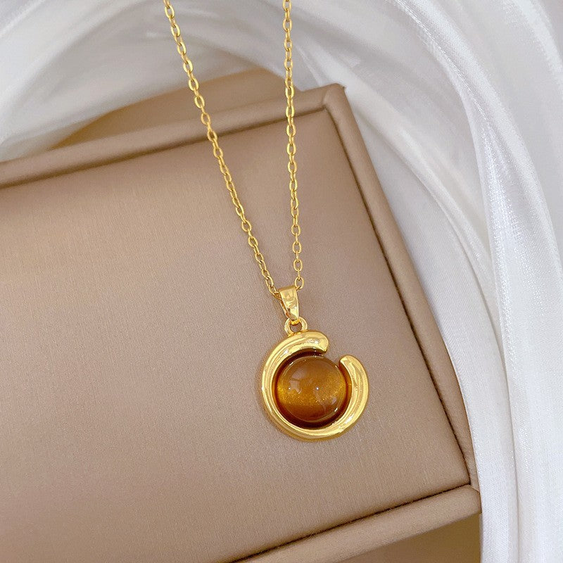 Elegant Amber Teardrop & Swirl Necklace Set