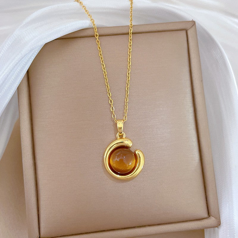 Elegant Amber Teardrop & Swirl Necklace Set