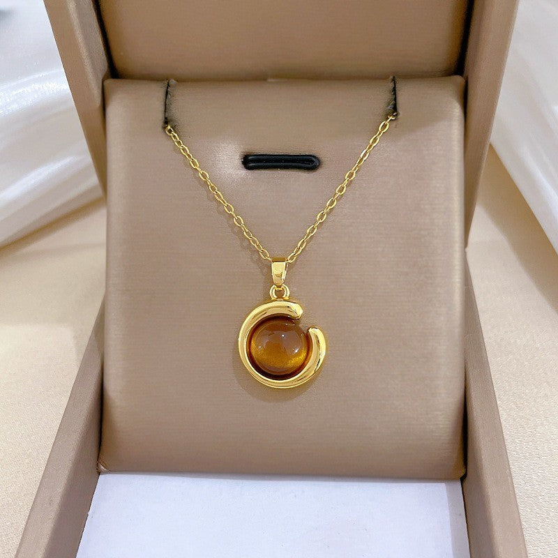 Elegant Amber Teardrop & Swirl Necklace Set