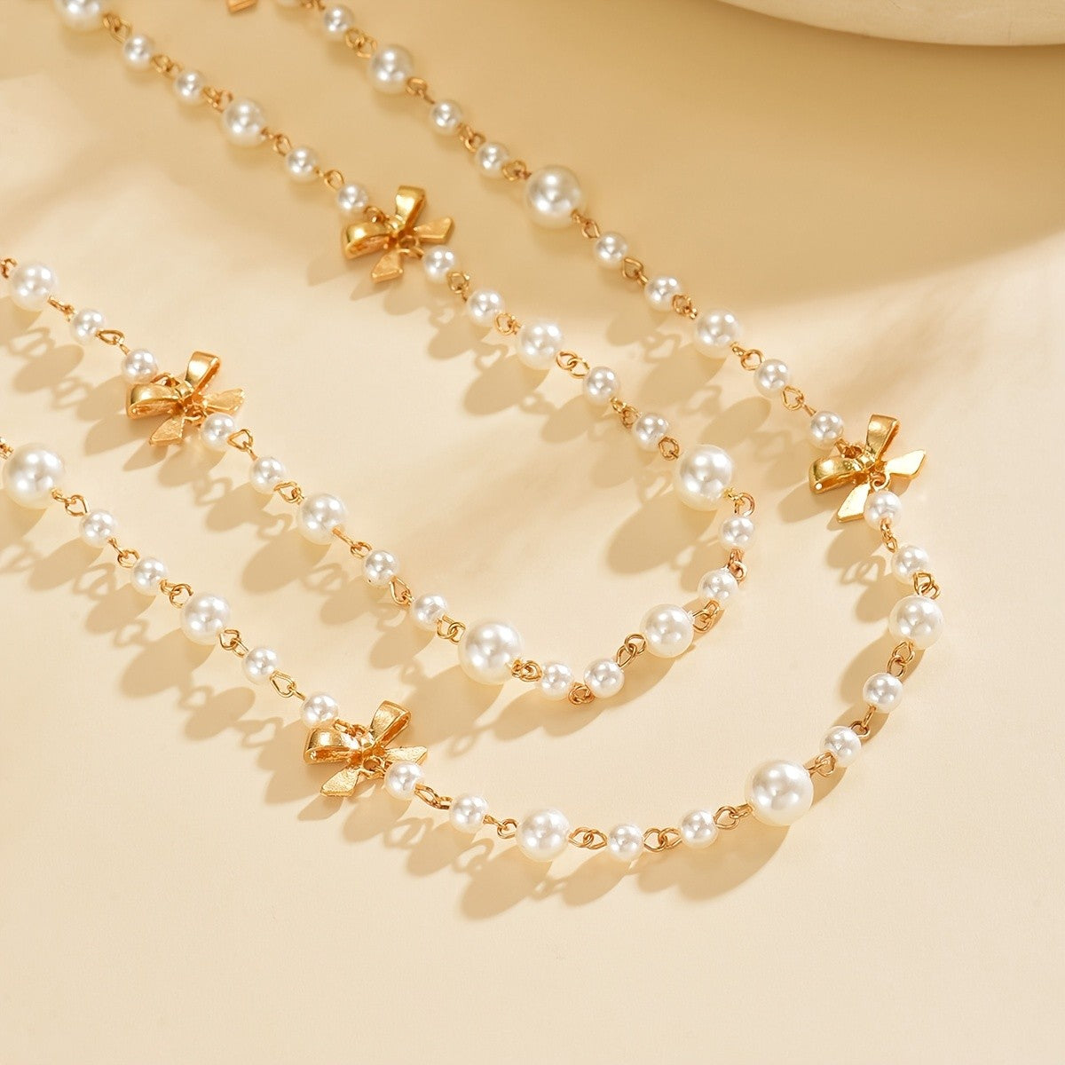 Elegant Layered Pearl Bow Necklace
