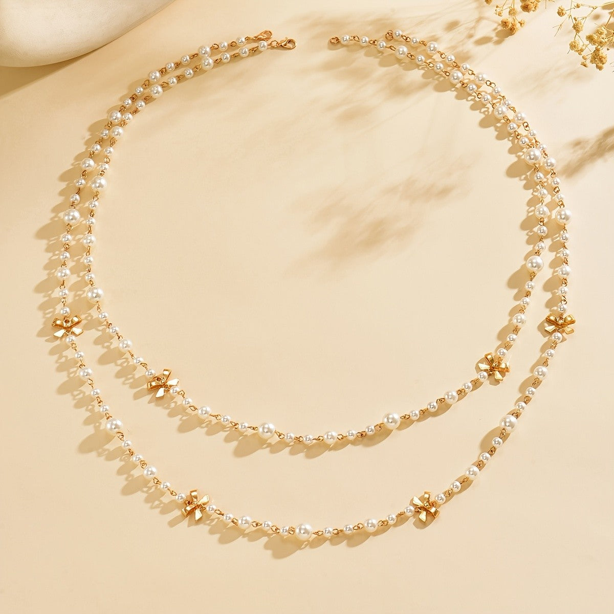 Elegant Layered Pearl Bow Necklace