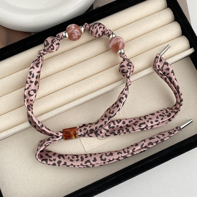 Elegant Leopard Print Pearl Scarf Necklace