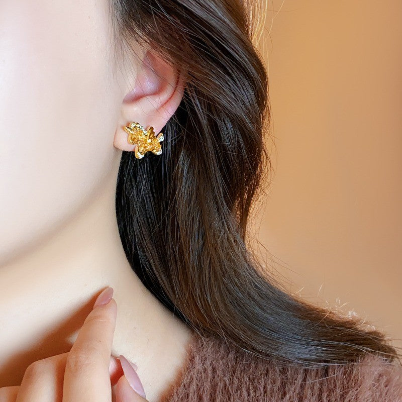 Classy Golden Pegasus Stud Earrings
