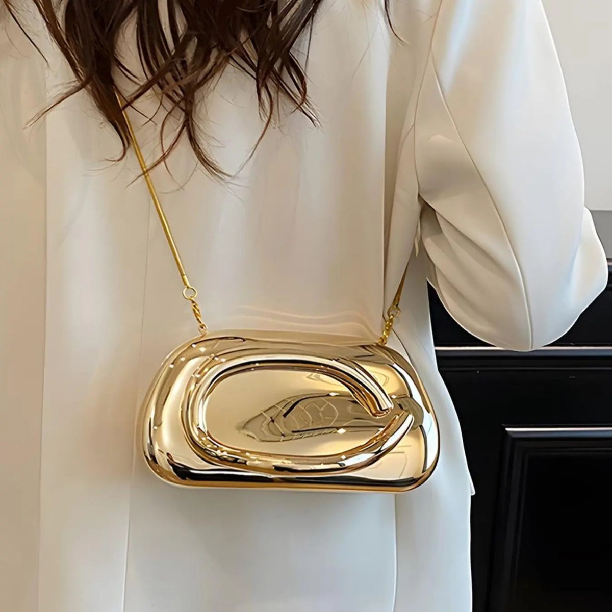 Elegant Metallic Oval Clutch