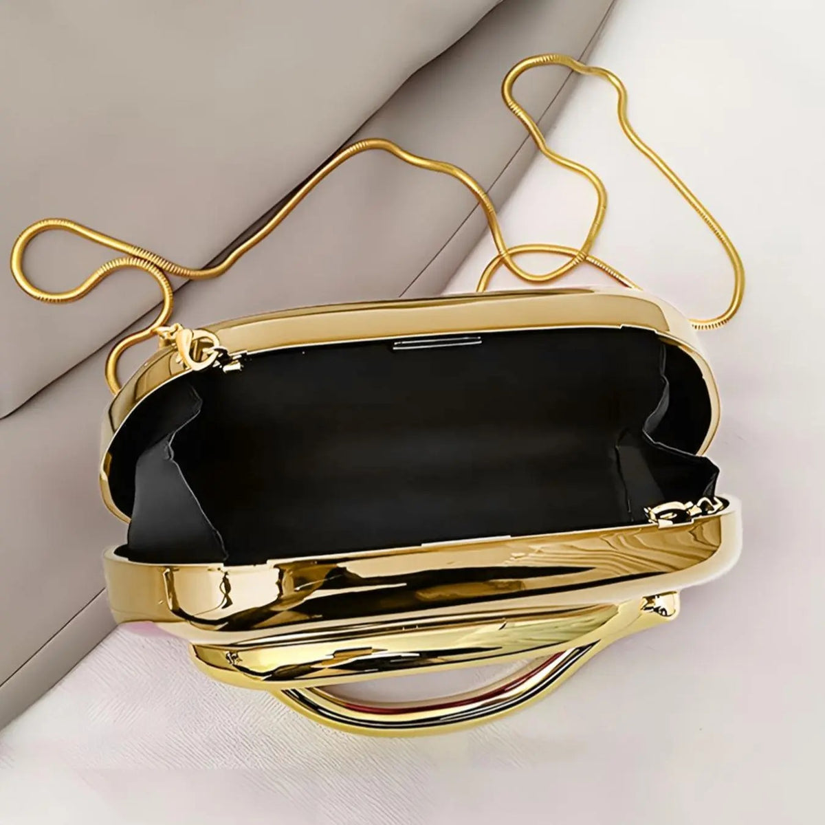 Elegant Metallic Oval Clutch