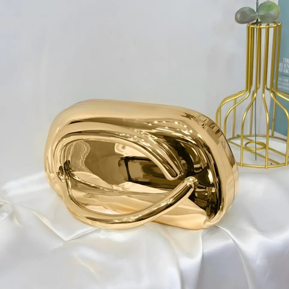 Elegant Metallic Oval Clutch