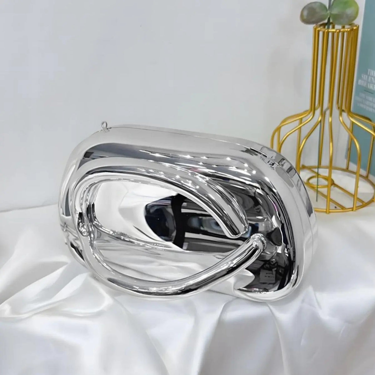 Elegant Metallic Oval Clutch