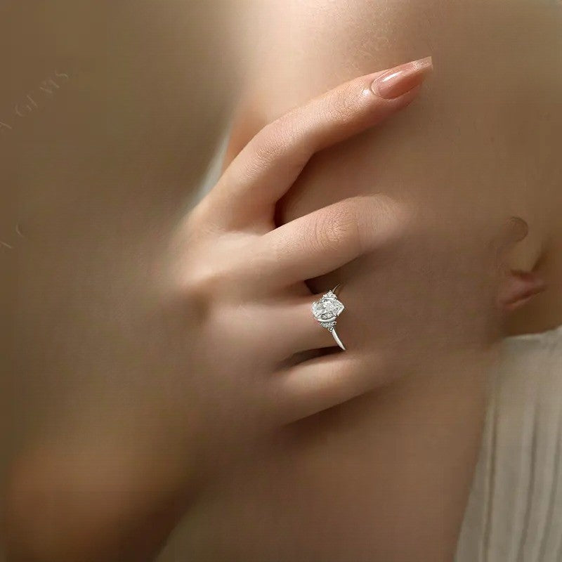 Elegant Marquise Side Stone Ring