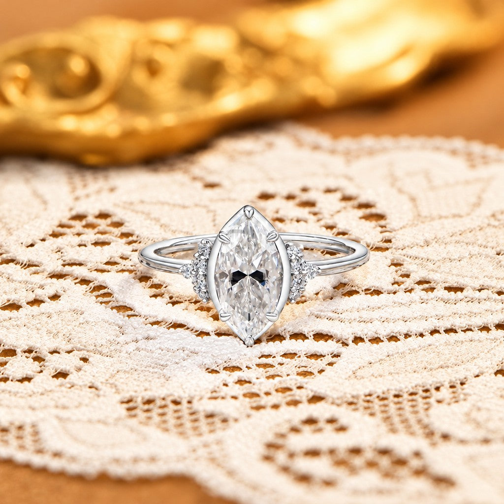 Elegant Marquise Side Stone Ring