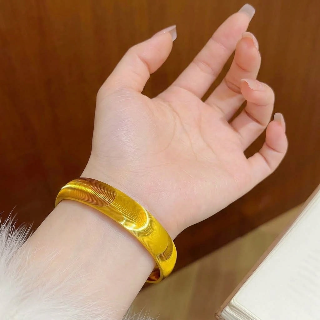 14K Elegant Spiral Bangle