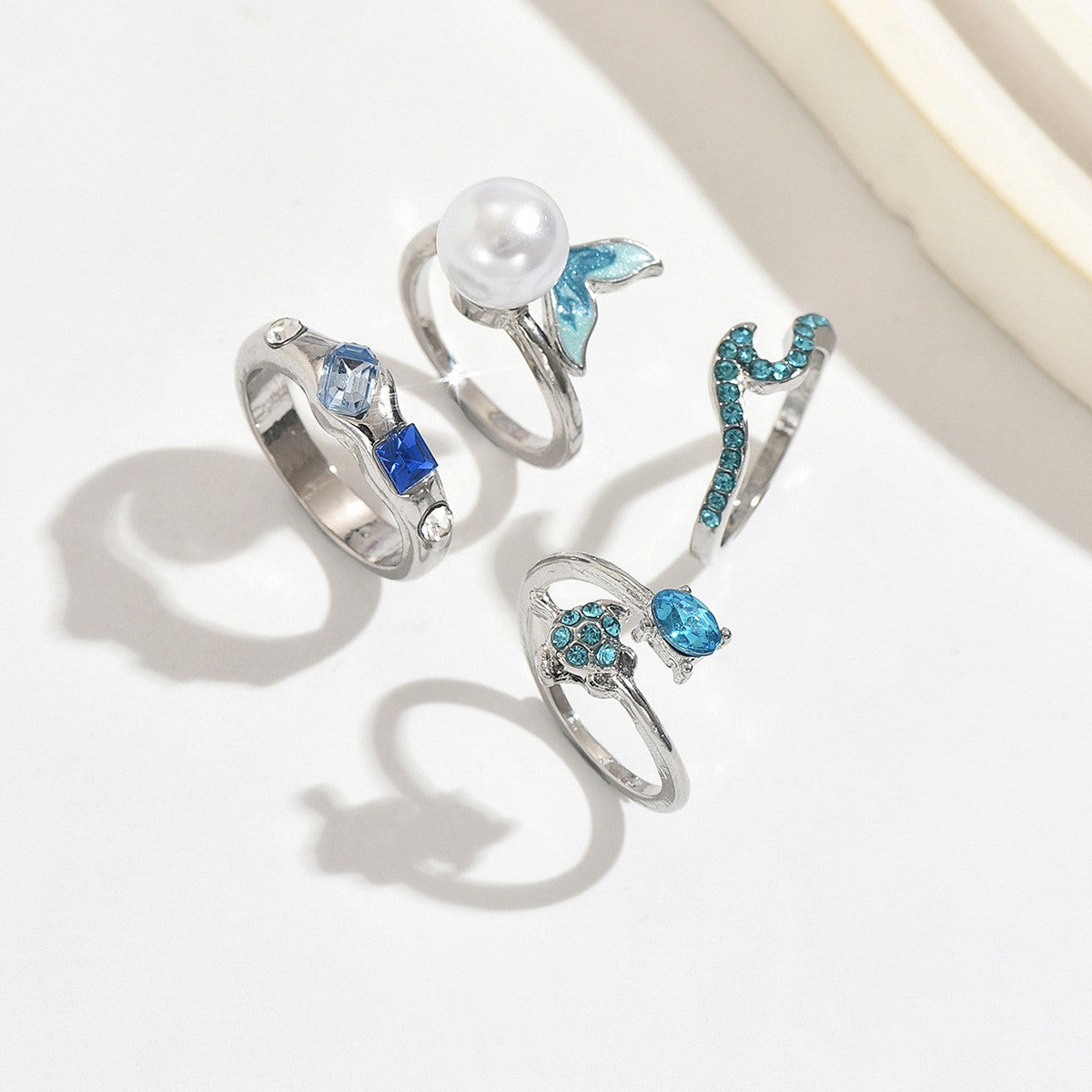 Dainty Ocean Wave & Dolphin Ring Set