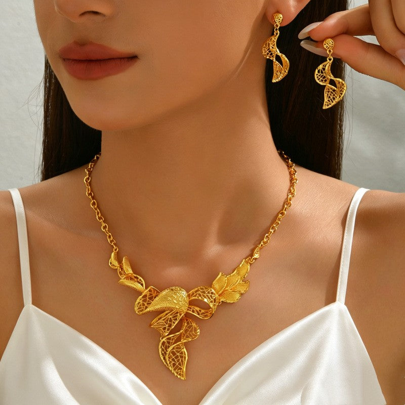 Elegant Filigree Leaf Necklace and Earrings Set