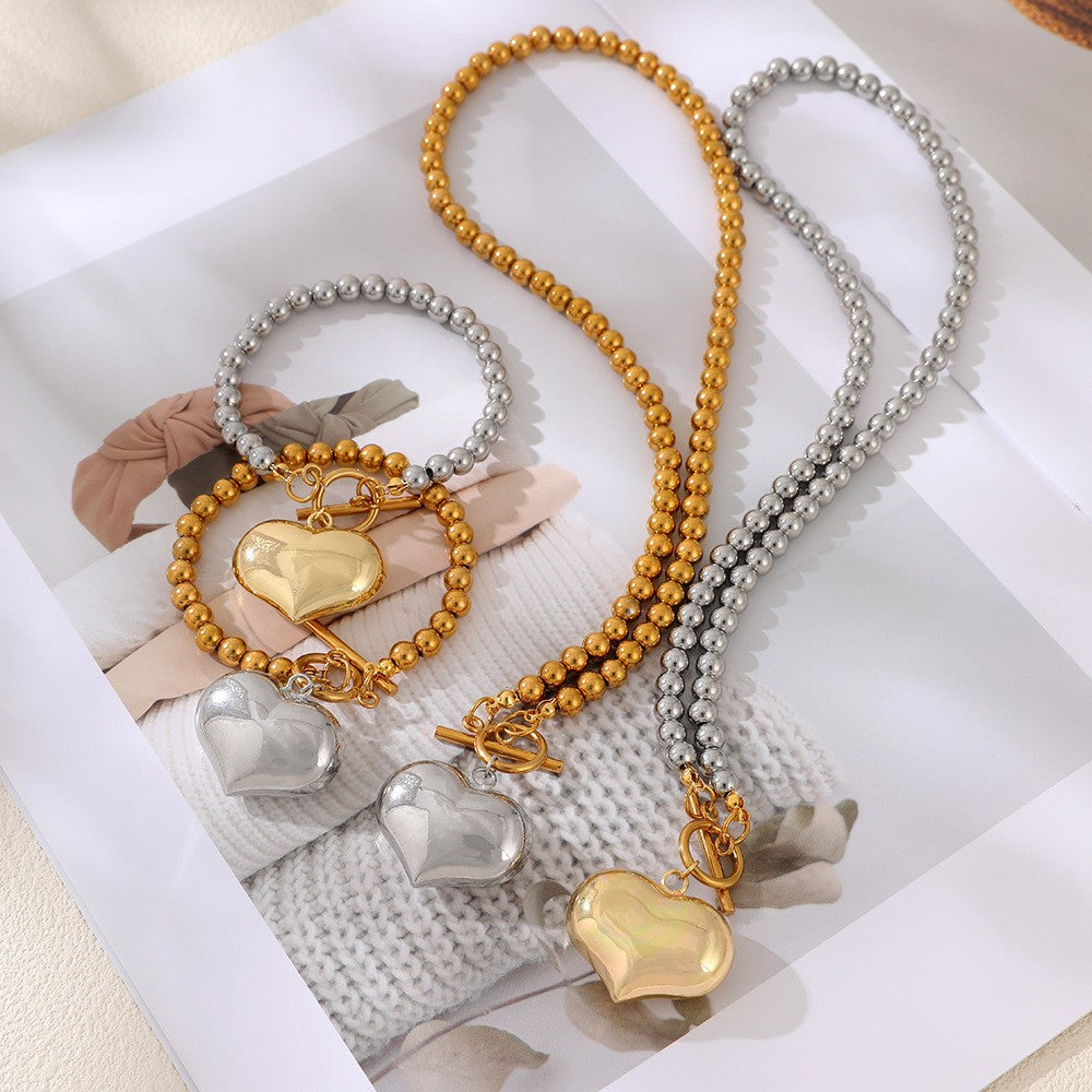 Classy Two-Tone Beaded Heart Toggle Set