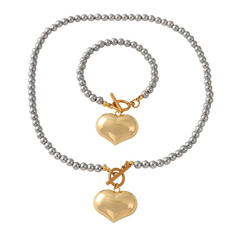 Classy Two-Tone Beaded Heart Toggle Set