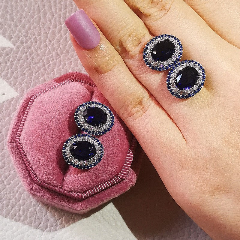 Classy Royal Blue Oval Halo Stud Earrings