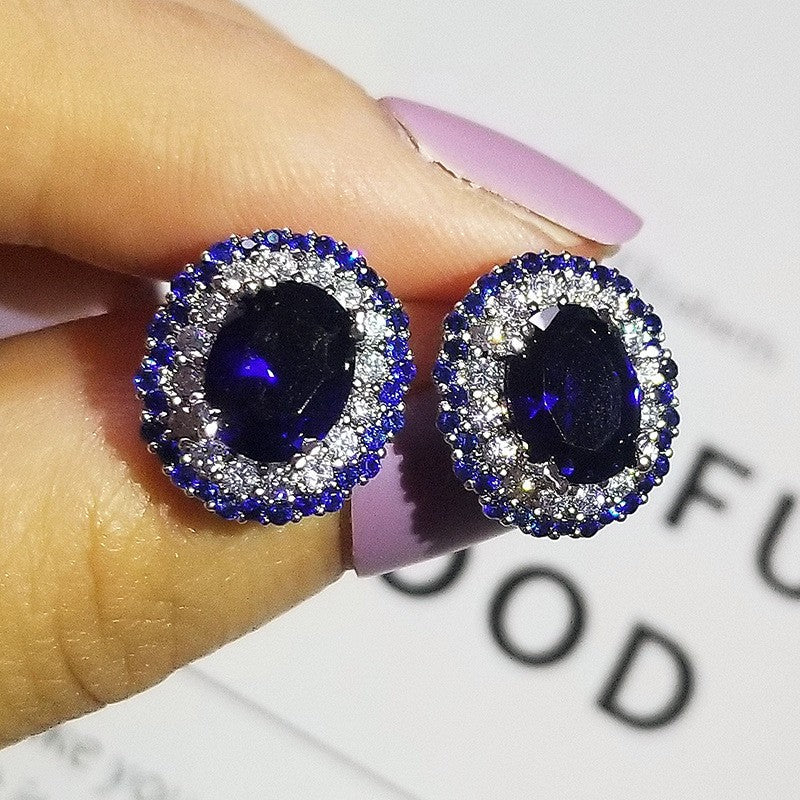 Classy Royal Blue Oval Halo Stud Earrings