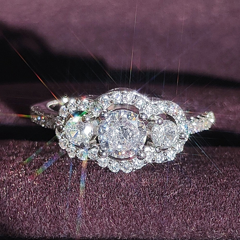 Classy Three Stone Halo Ring