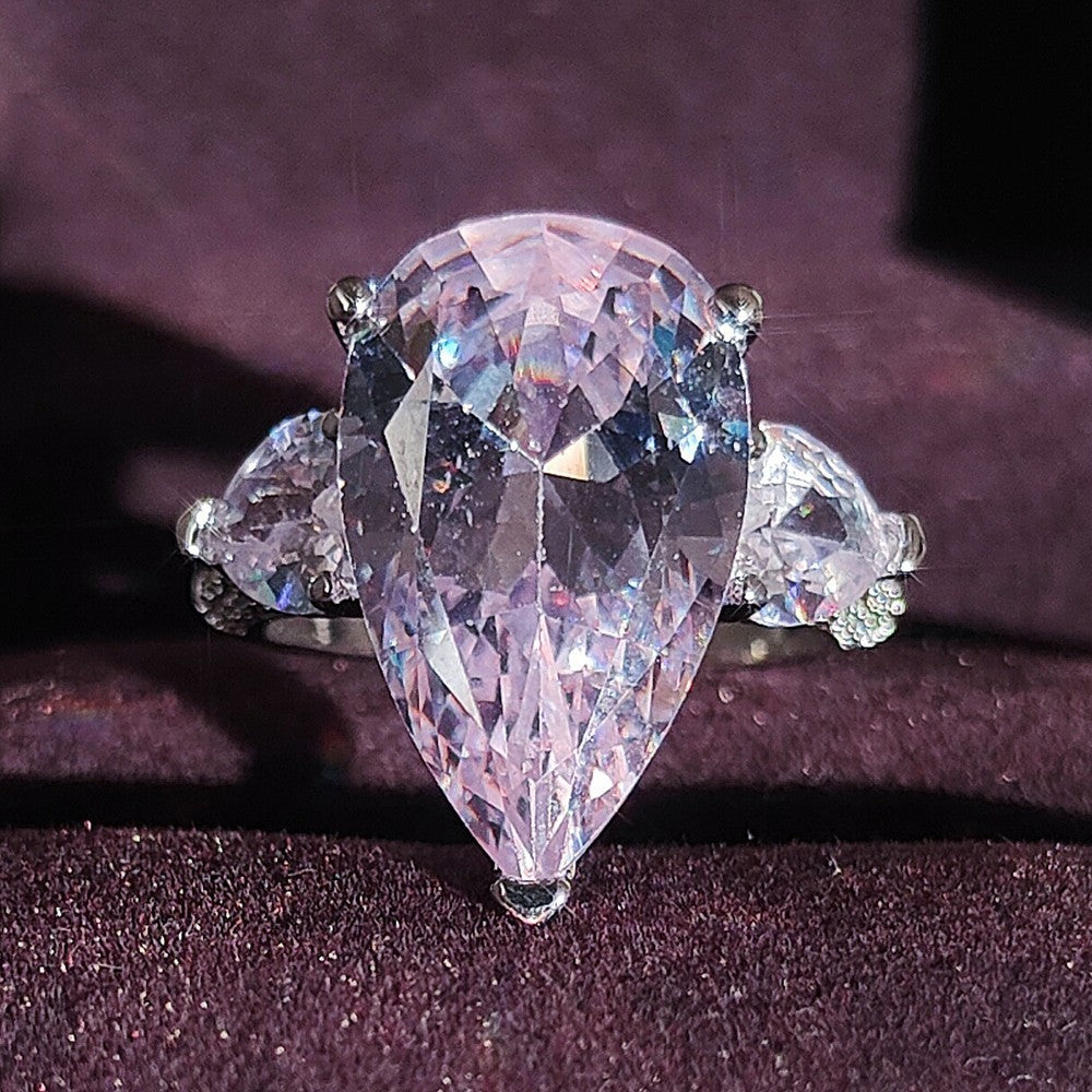 Elegant Pear Cut Three Stone Ring