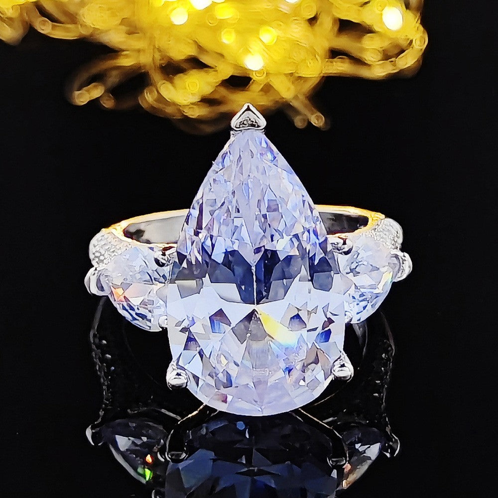 Elegant Pear Cut Three Stone Ring