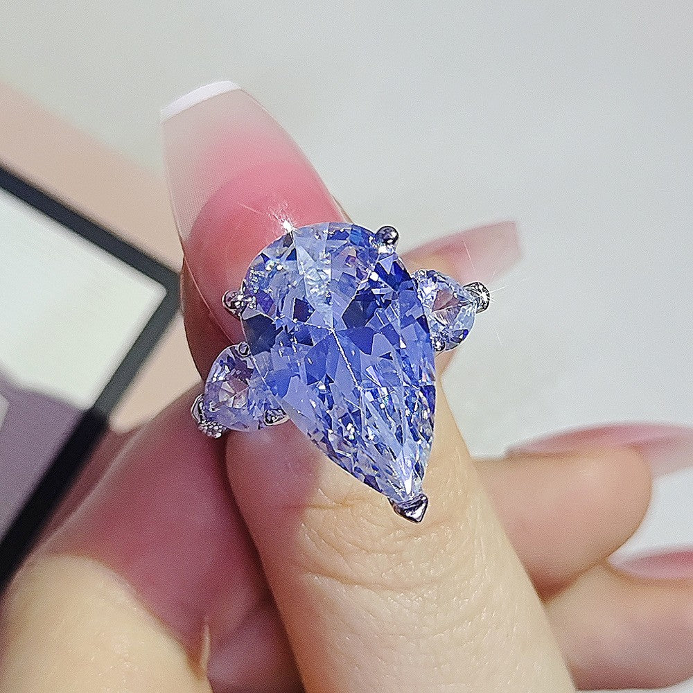 Elegant Pear Cut Three Stone Ring
