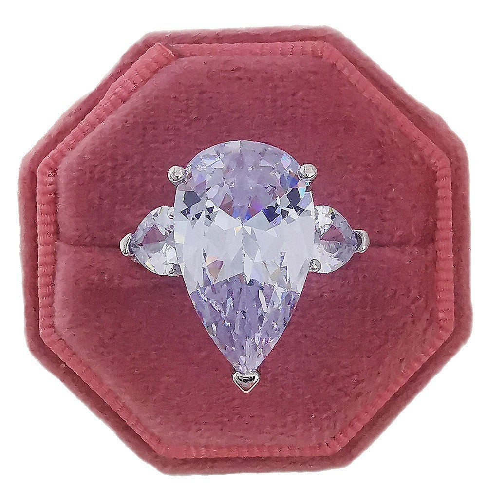 Elegant Pear Cut Three Stone Ring