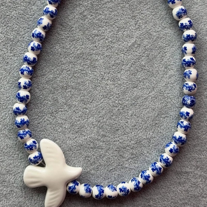 Classy Blue Floral Ceramic Dove Necklace