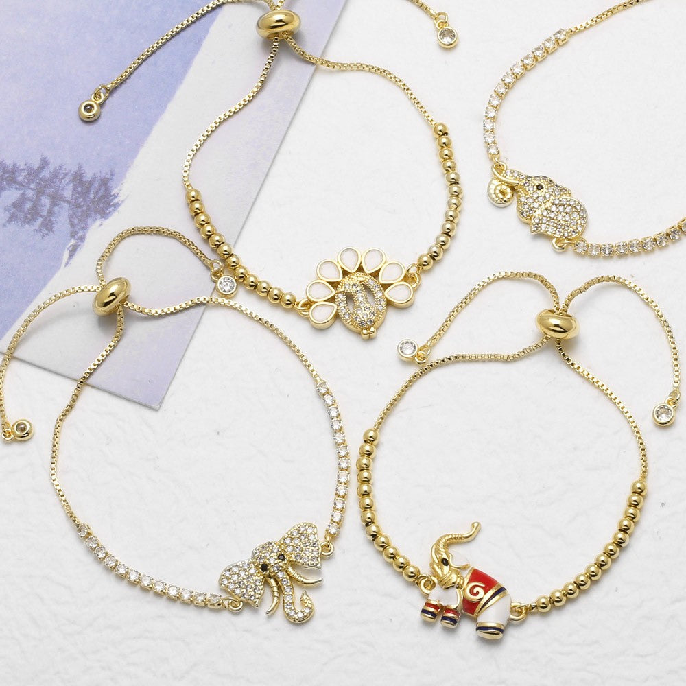 18k Dainty Elephant & Paw Charm Bracelet