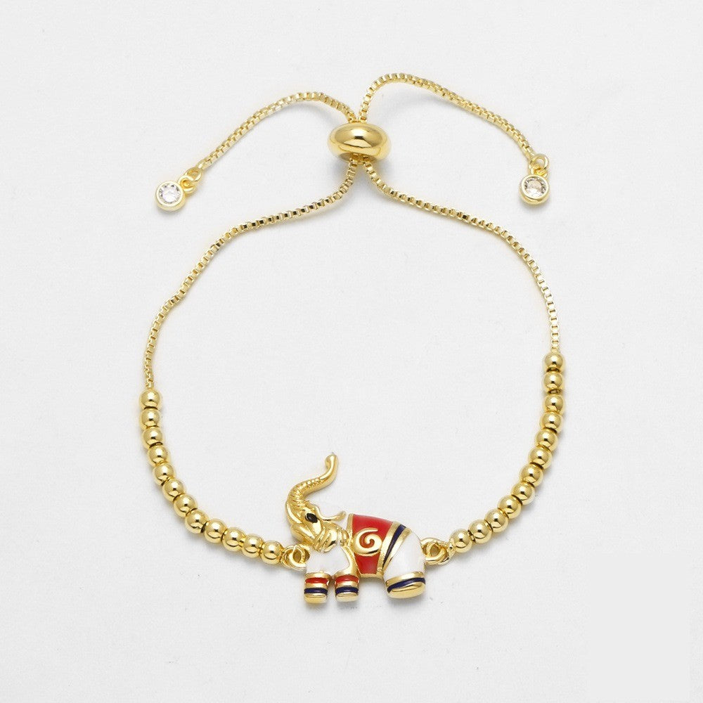 18k Dainty Elephant & Paw Charm Bracelet