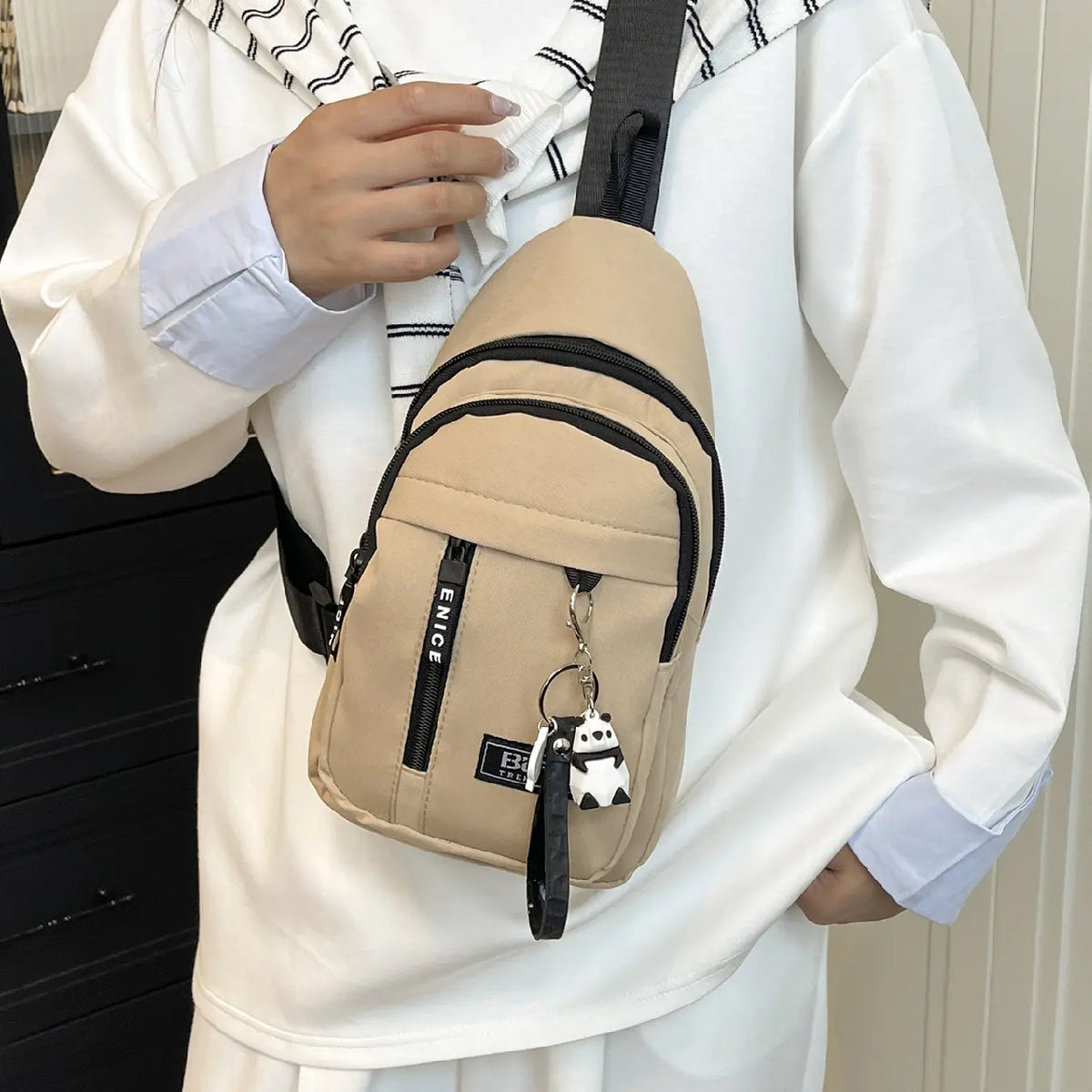 Everyday Multi Pocket Sling Bag with Animal Pendant