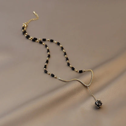 Black and Gold Crystal Ball Necklace - Veinci