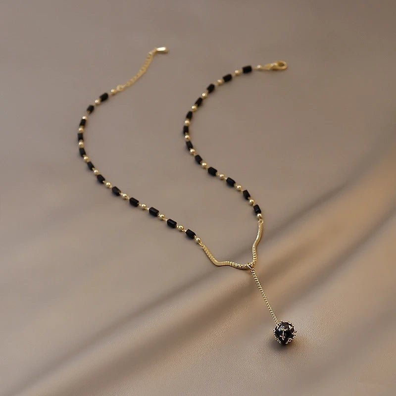 Black and Gold Crystal Ball Necklace - Veinci