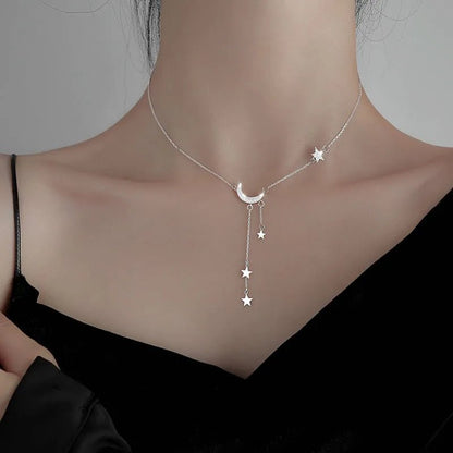 Crescent Moon Dangling Star Necklace - Veinci