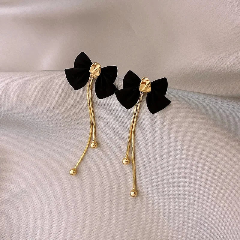 Dainty Bow Gold Dangle Earrings - Veinci