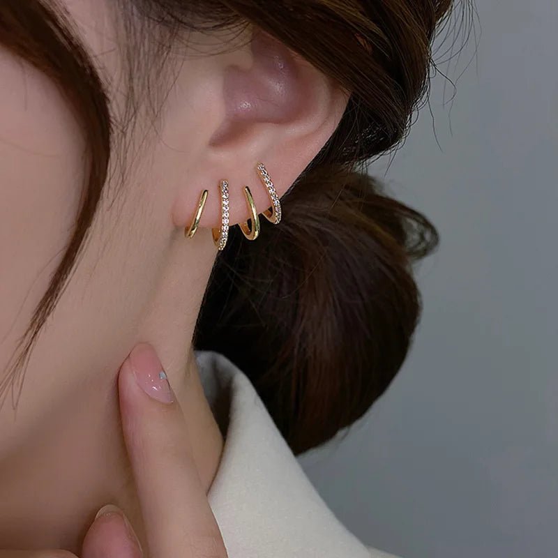 Dainty Shimmering Claw Huggie Earrings - Veinci