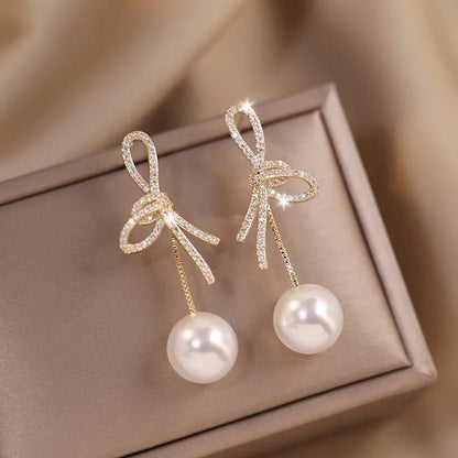 Dazzling Bowknot Pearl Drop Earrings - Veinci