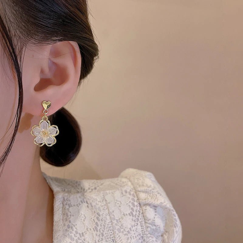 Elegant Gold Accented Floral Earrings - Veinci