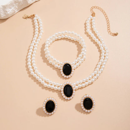 Elegant Oval Diamond Pearl Necklace, Bracelet, Earrings Set - Veinci