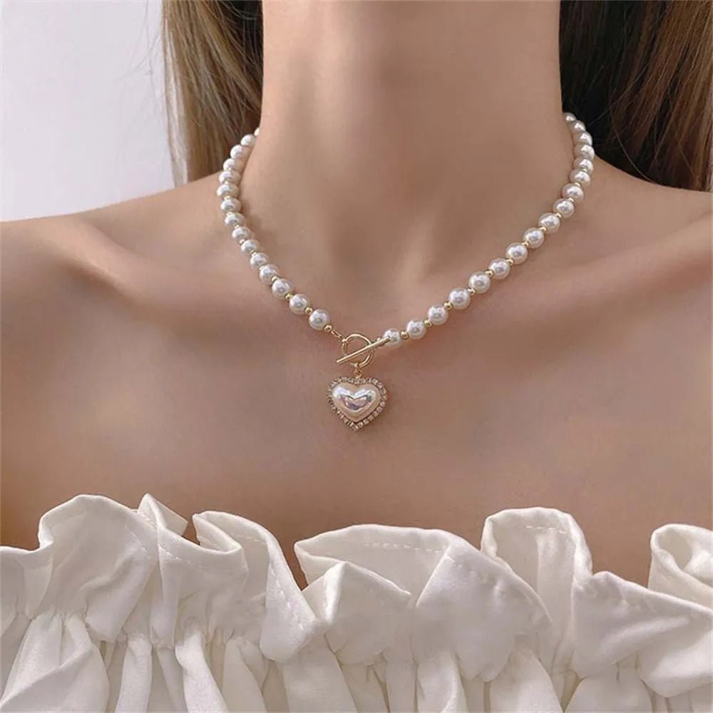 Pearl necklace with heart locket discount