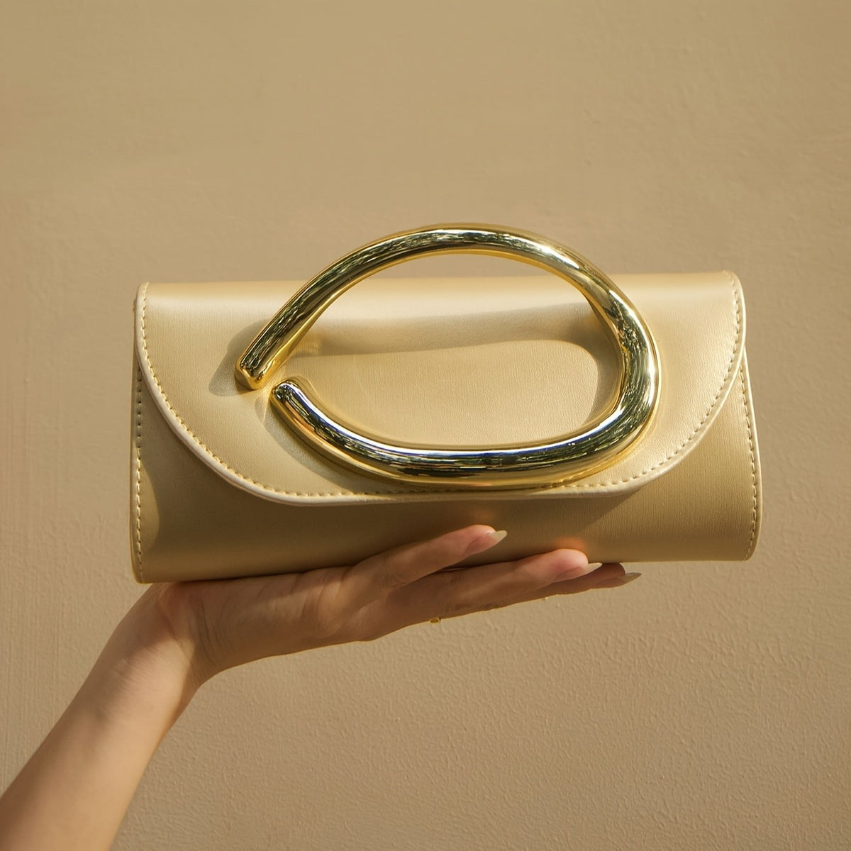 Classy Oval Metal Handle Clutch